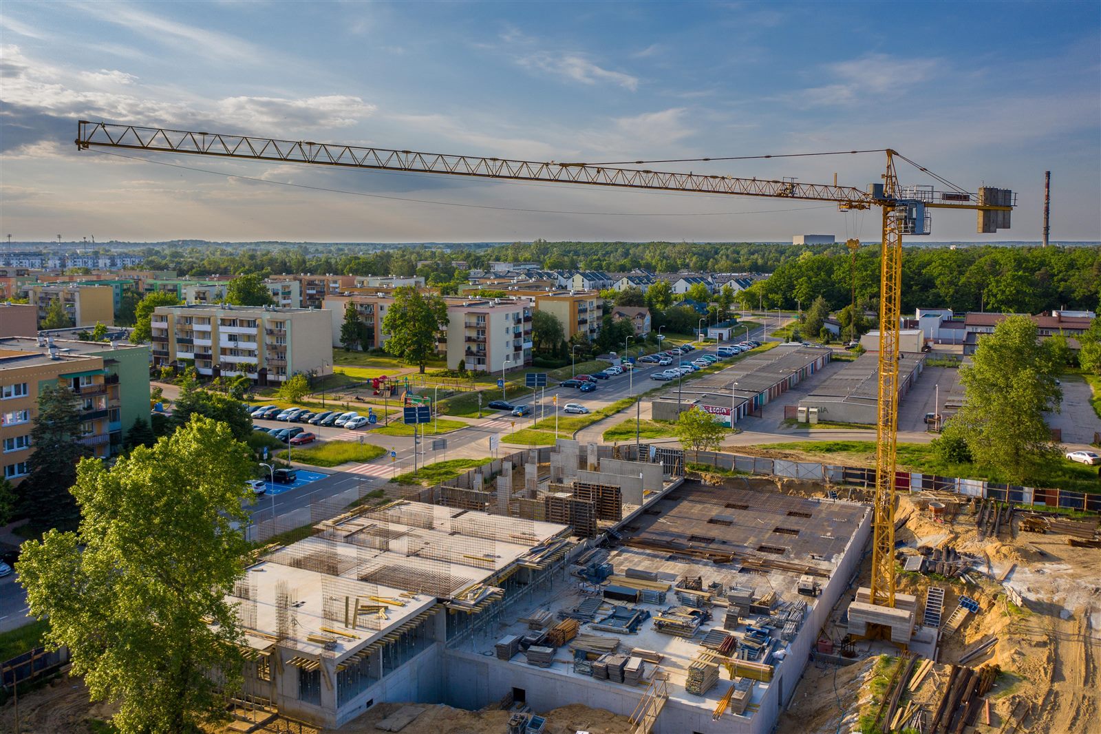 Aerial construction site overview during foundation phase